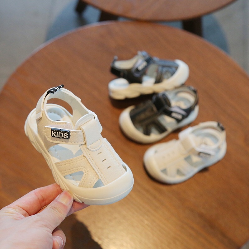 Sandal trẻ em tập đi mũi rọ KIDS dáng quai hậu chống vấp bảo vệ bàn chân bé mã SDE2