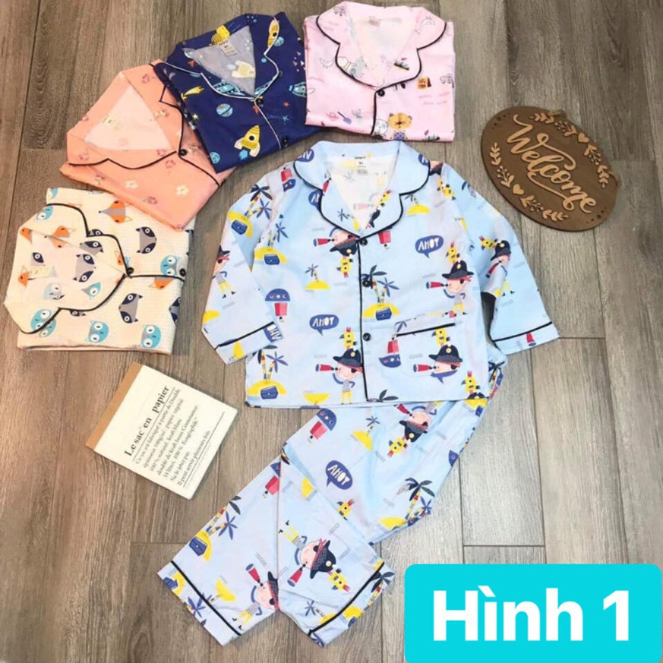 Pijama thô lụa viền đen in hình ngộ nghĩnh cho bé.