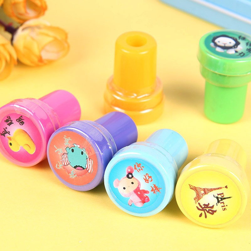 Con dấu mực đỏ vỏ nhựa nhiều hình dạng cho bé