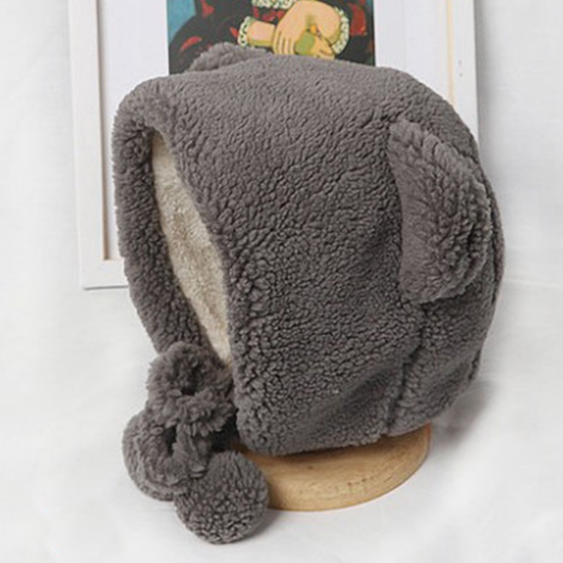 Mũ lông nhung dày dặn hình tai gấu có dây buộc cằm đính quả bông giữ ấm chống gió mùa đông cho nữ