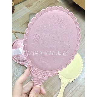 Gương soi cầm tay