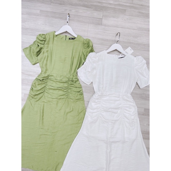 Váy rúm eo tay phồng cổ tròn xinh