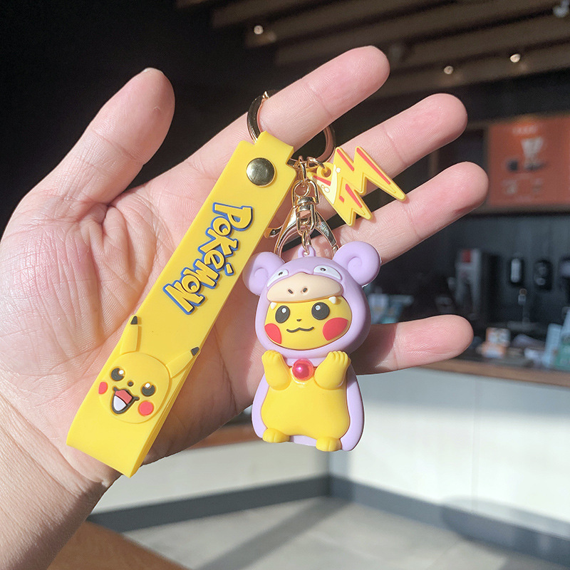 the creative personality of pikachu schobag around plastic plastic plastic dolls in the car with the keys of his necklace.
