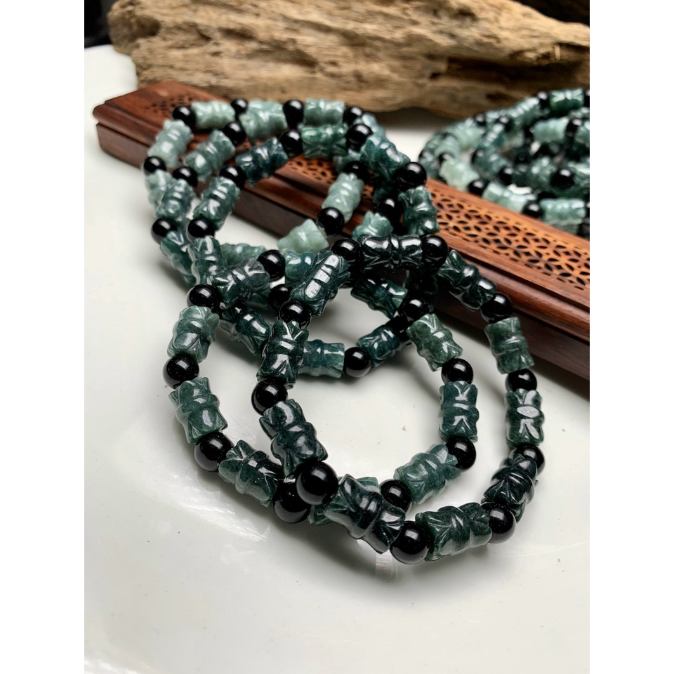 Vòng tay ống trúc chạm hoa sen đá cẩm thach lam