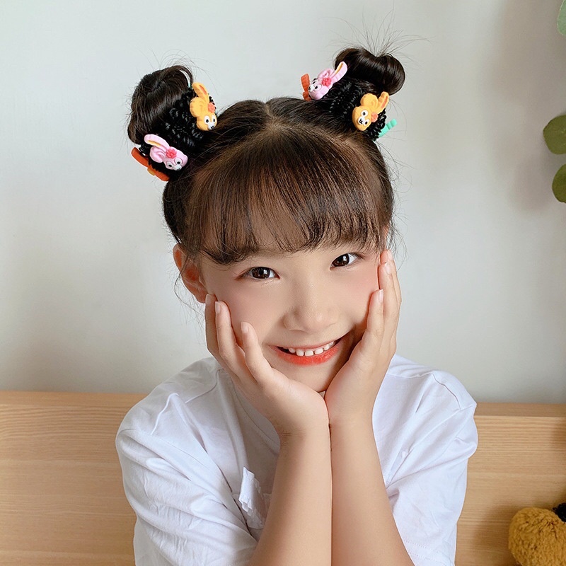 Cột tóc giả búi xoăn kèm icon cho bé gái dễ thương