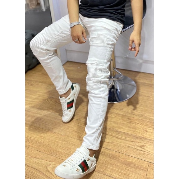 Quần jean trắng vá nhăn gối khâu viền,quần bò màu trắng vá nhăn gối AMIRI dáng slimfit