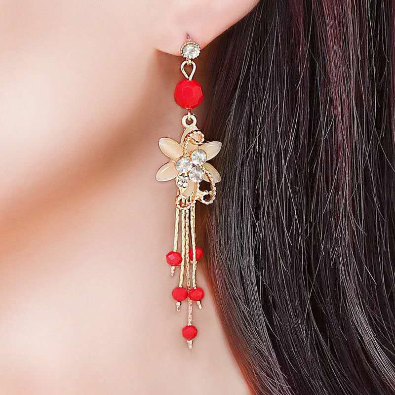 Bông tai tua rua hình hoa đính đá opal và gắn hạt đỏ MS192