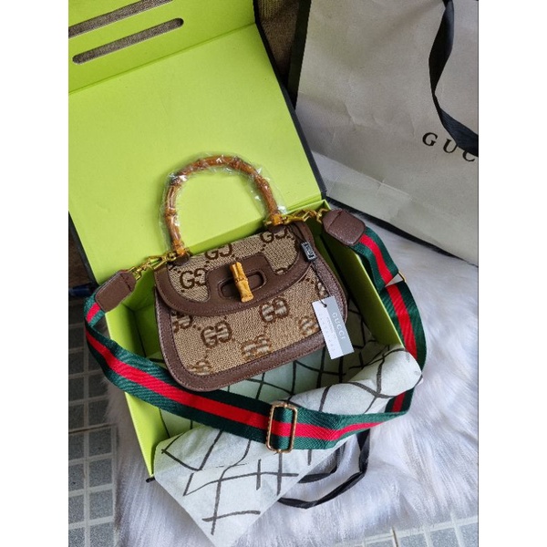 Túi gc quai gỗ logo GG to size22