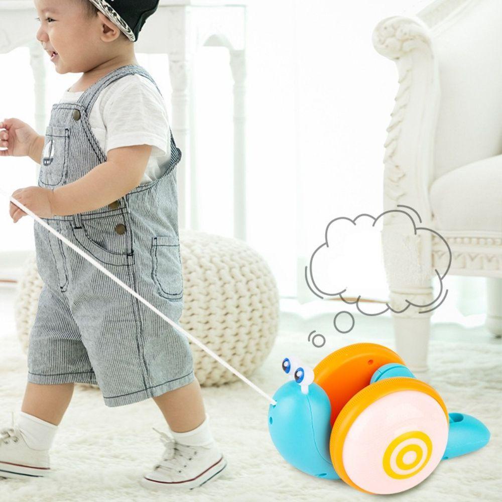 Đồ Chơi Hình Thú Hoạt Hình Tập Bò Phát Nhạc Cho Trẻ Em REBUY1