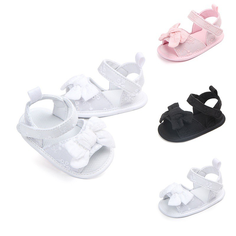 Giày sandal đính nơ thiết kế đế mềm êm chân chống trượt cho bé tập đi