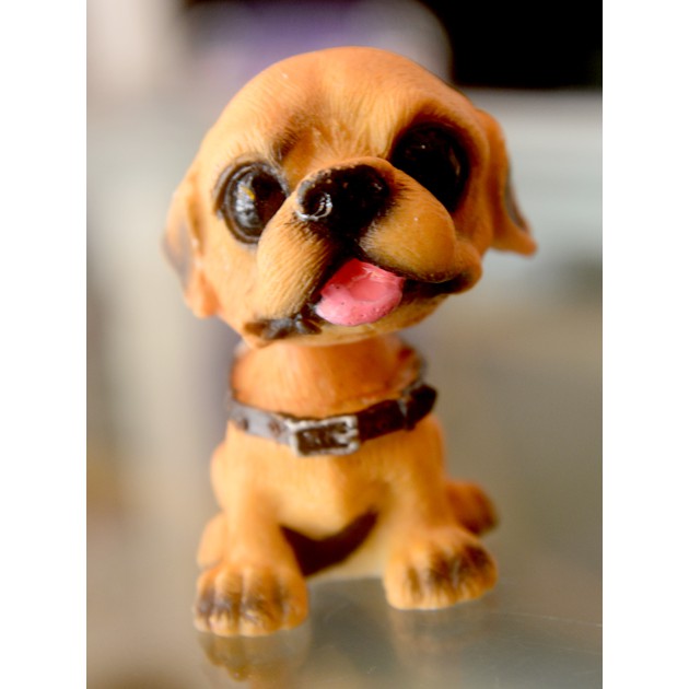 Một tượng chó lò xo lắc đầu để xe hơi ngộ nghĩnh(giá một tượng)