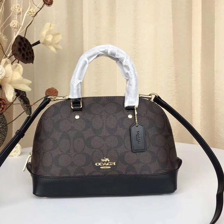 Túi xách Coach hến nâu đen đậm