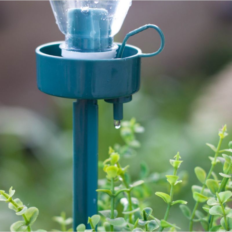 Dụng cụ tưới nước cho chậu cây,,,