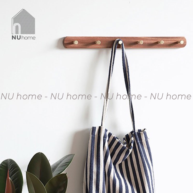 nuhome.vn | Thanh treo đồ Mooli được thiết kế đơn giản đẹp mắt với chất liệu gỗ cao cấp và móc treo bằng đồng sang trọng