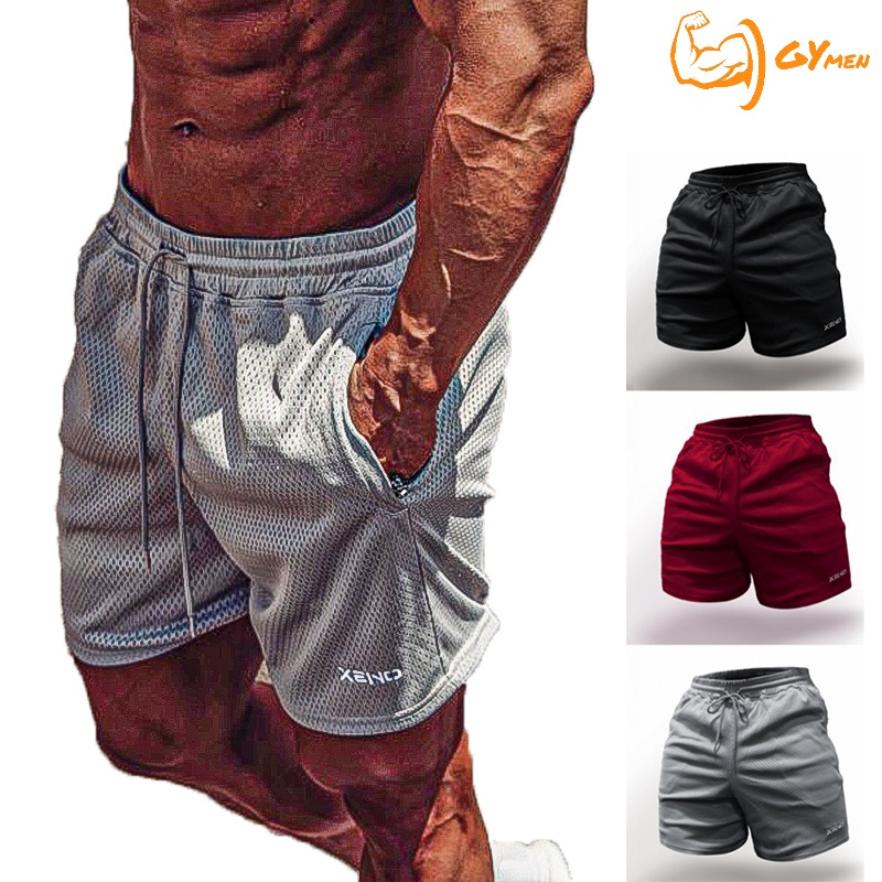 [ GYMEN ] Quần short thể thao nam  thoải mái  chạy bộ  nhanh khô  tập thể dục thoáng khí quần bóng rổ  rộng rãi  cỡ lớn  ngoài trời   huấn luyện  hút mồ hôi