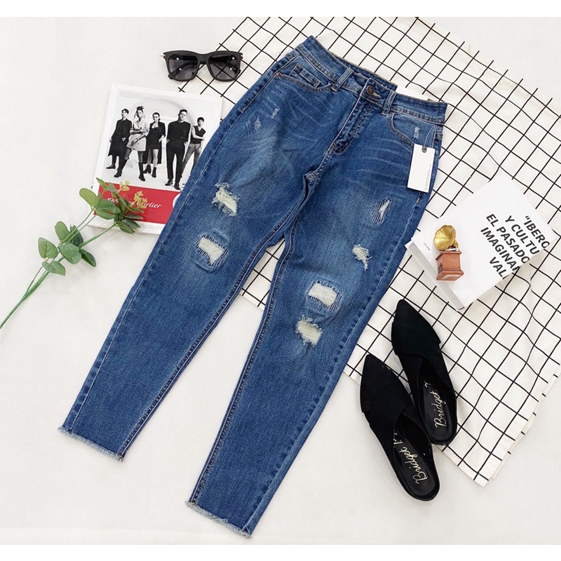 Quần jeans thiêu rách