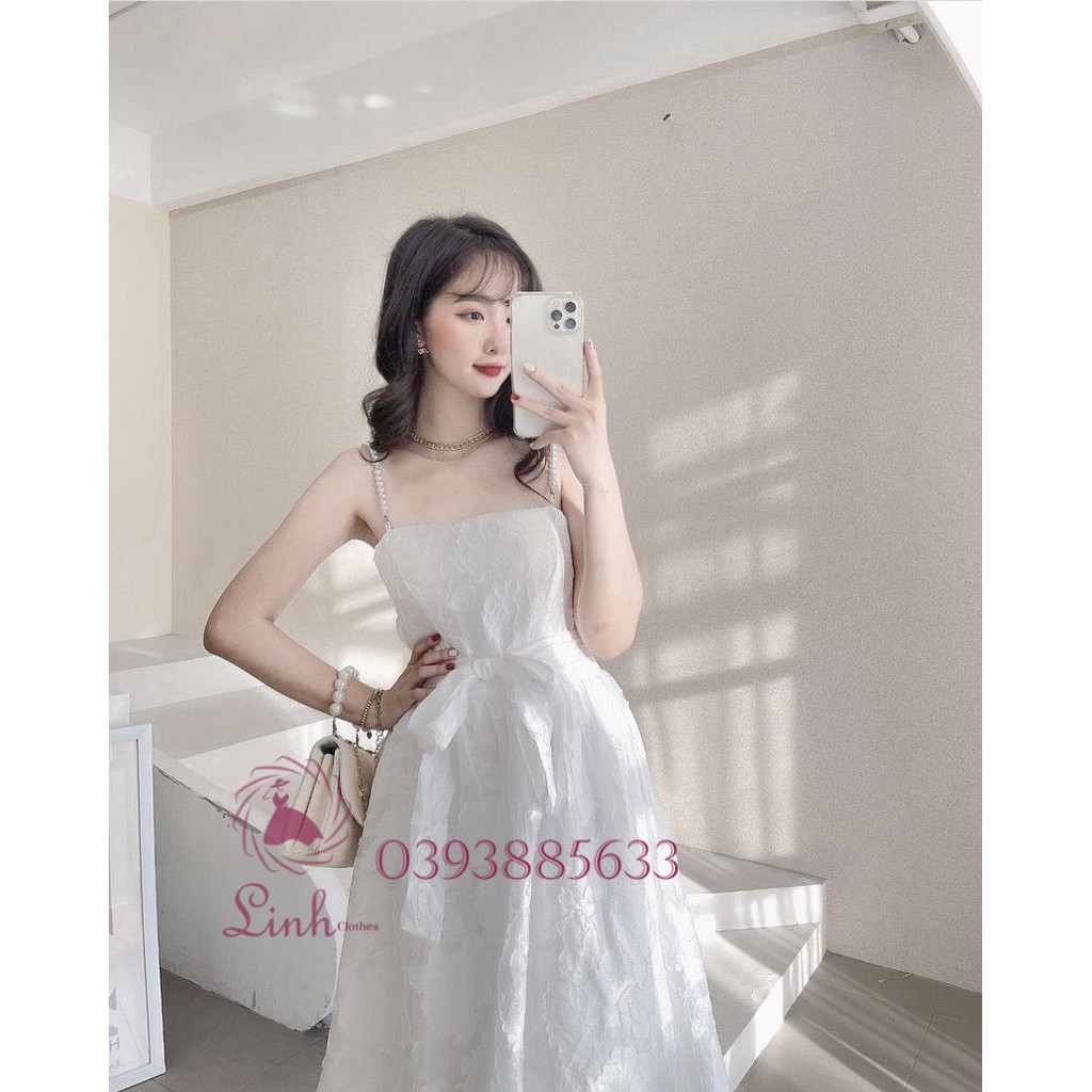 Đầm tiểu thư trắng gấm nơ hai dây vai đính hạt