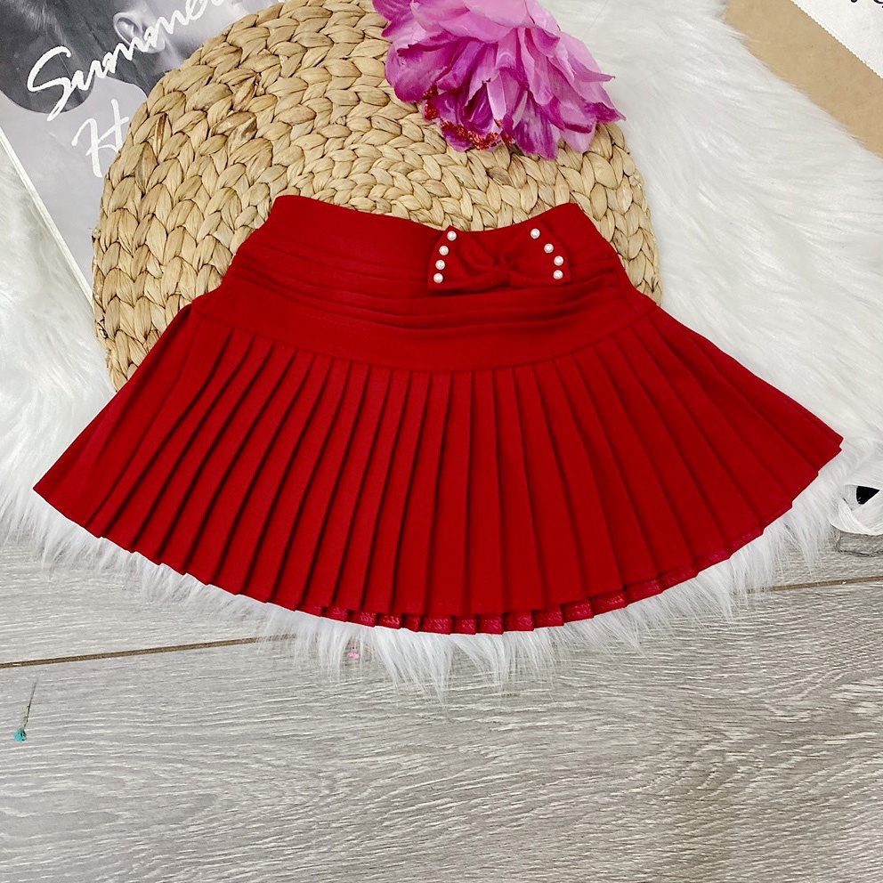 Váy xếp ly phối nơ diệu đà cho bé gái diện lễ đi chơi đi học