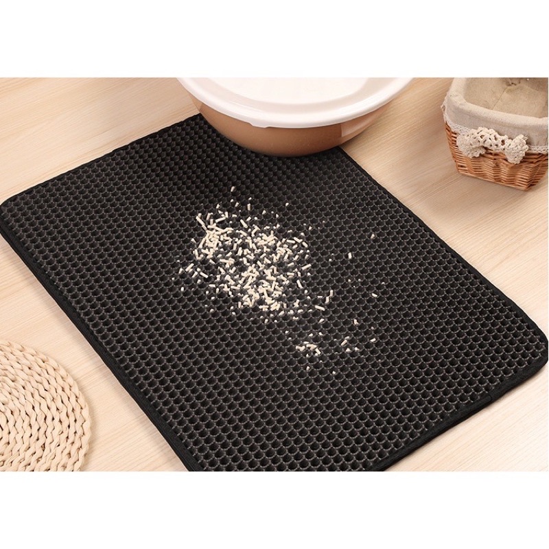 Thảm hứng cát mèo