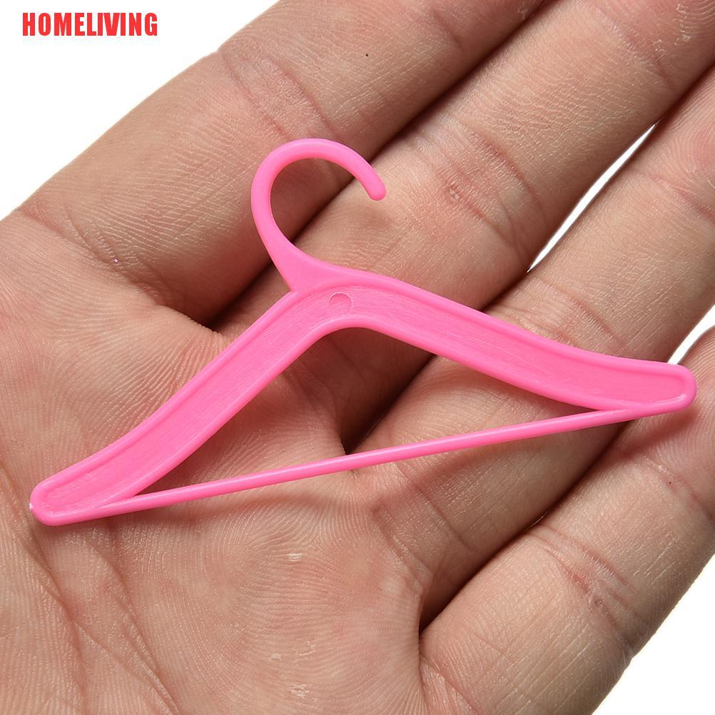 Set 20 Móc Treo Quần Áo Búp Bê Barbie Bằng Nhựa Màu Hồng