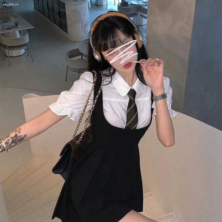 ◐Little black dress strap dress female summer hot girl jk uniform sling pleated skirt + puff sleeve shirt two-piece suit