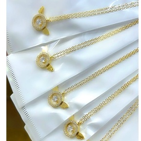 Dây chuyền titan mặt tròn đính đá phối đôi cánh không gỉ