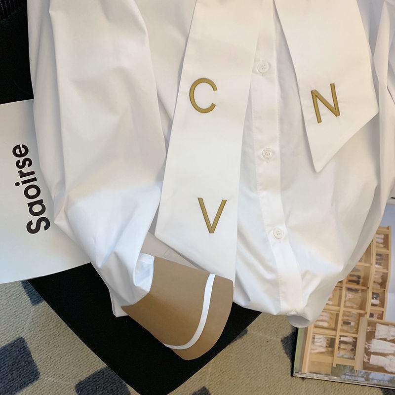 Áo Sơ Mi Trắng Phối Ren Thêu Họa Tiết Thắt Nơ Thời Trang Mùa Thu Cho Nữ