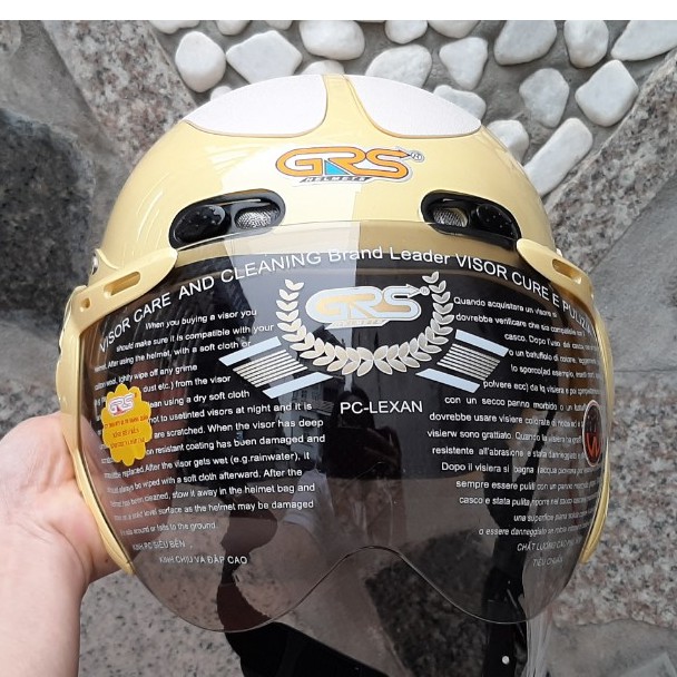 Mũ bảo hiểm 1/2 đầu có kính GRS A102K vàng line trắng bảo hành 12 tháng