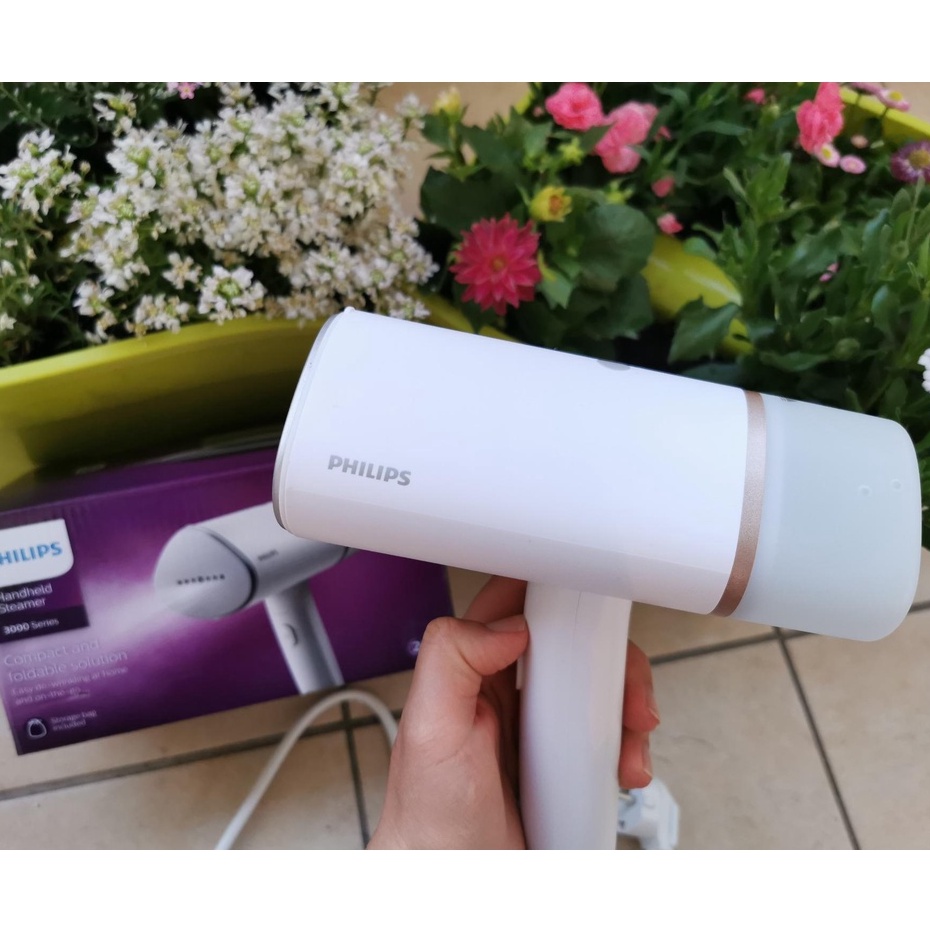 Bàn là, bàn ủi hơi nước cầm tay Philips công suất 1000W, nhỏ gọn, là phẳng dễ dàng, bảo hành 2 năm - STH3020/10