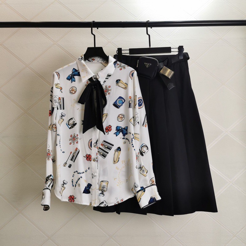 Set trang phục nữ 𝘾𝙝𝙖𝙣𝙚𝙡 áo sơ mi in hình CN kết hợp với chân váy dài dáng xoè
