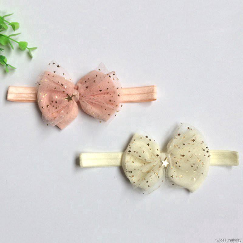 Băng đeo đầu có chi tiết nơ trang trí