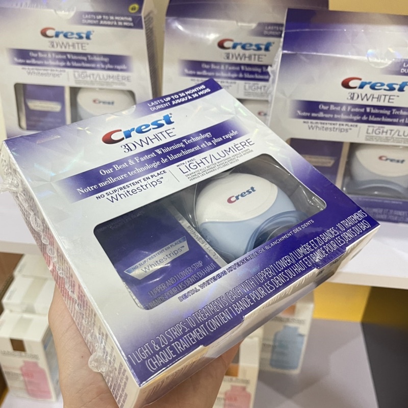 Miếng dán kèm máy chiếu làm trắng răng Crest 3D White 20 Whitestrips &amp; 1 Light