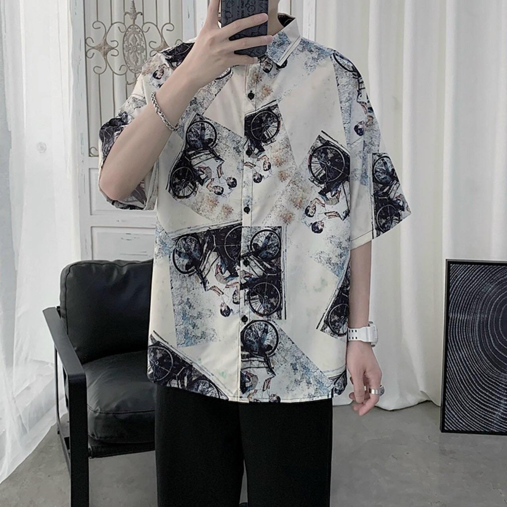 Áo sơ mi tay ngắn hoạ tiết độc đáo thiết kế dáng rộng thoải mái | BigBuy360 - bigbuy360.vn