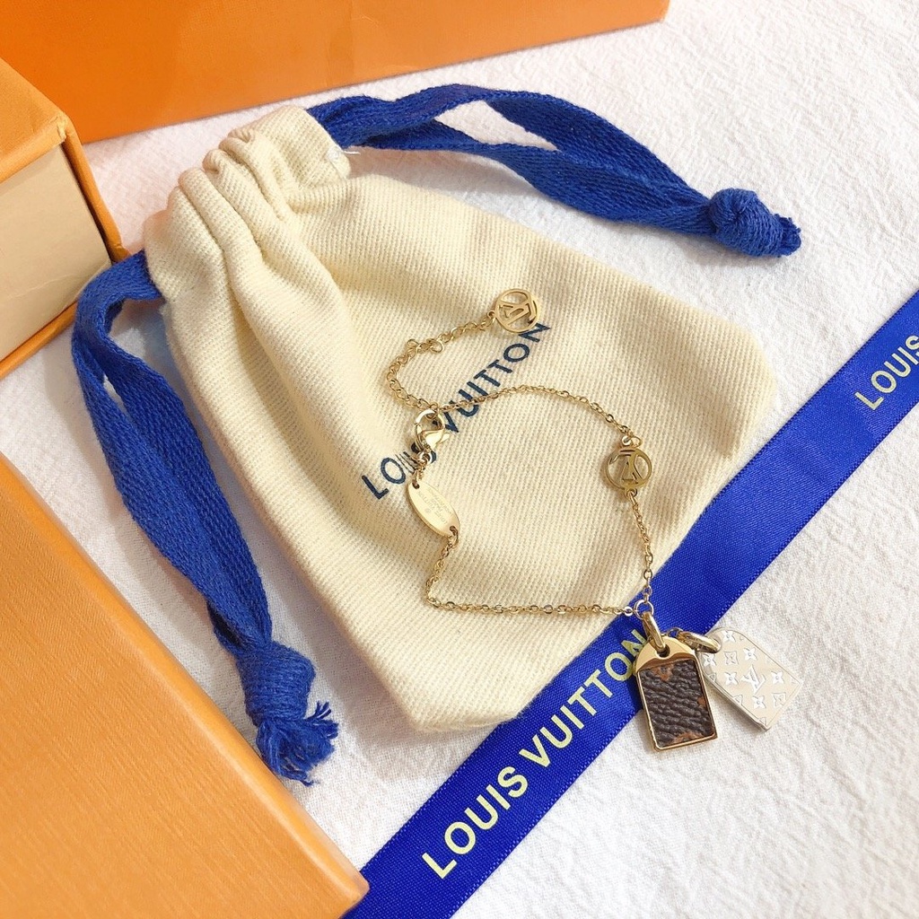 Vòng Tay Louis Vuitton Bằng Thép Titan Họa Tiết Chữ LV Sang Trọng Thời Trang
