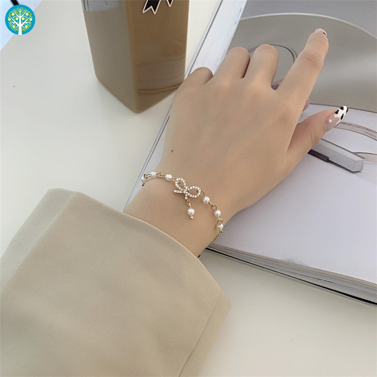 Vòng Tay Mạ Vàng Đính Ngọc Trai Nhân Tạo Hình Nơ Xinh Xắn Cho Nữ