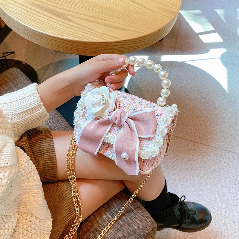 Túi Đeo Chéo Hình Nơ Đính Ngọc Trai Dễ Thương Cho Bé Gái