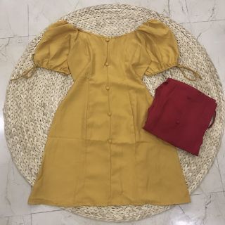 Đầm nút bọc tay nơ