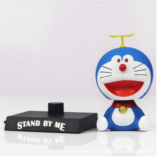 Búp bê Doraemon đầu gật gù để trang trí bàn học, táp lô xe hơi