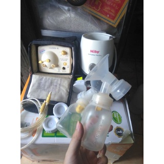Thanh lý máy hút sữa medela pump tặng hâm sữa