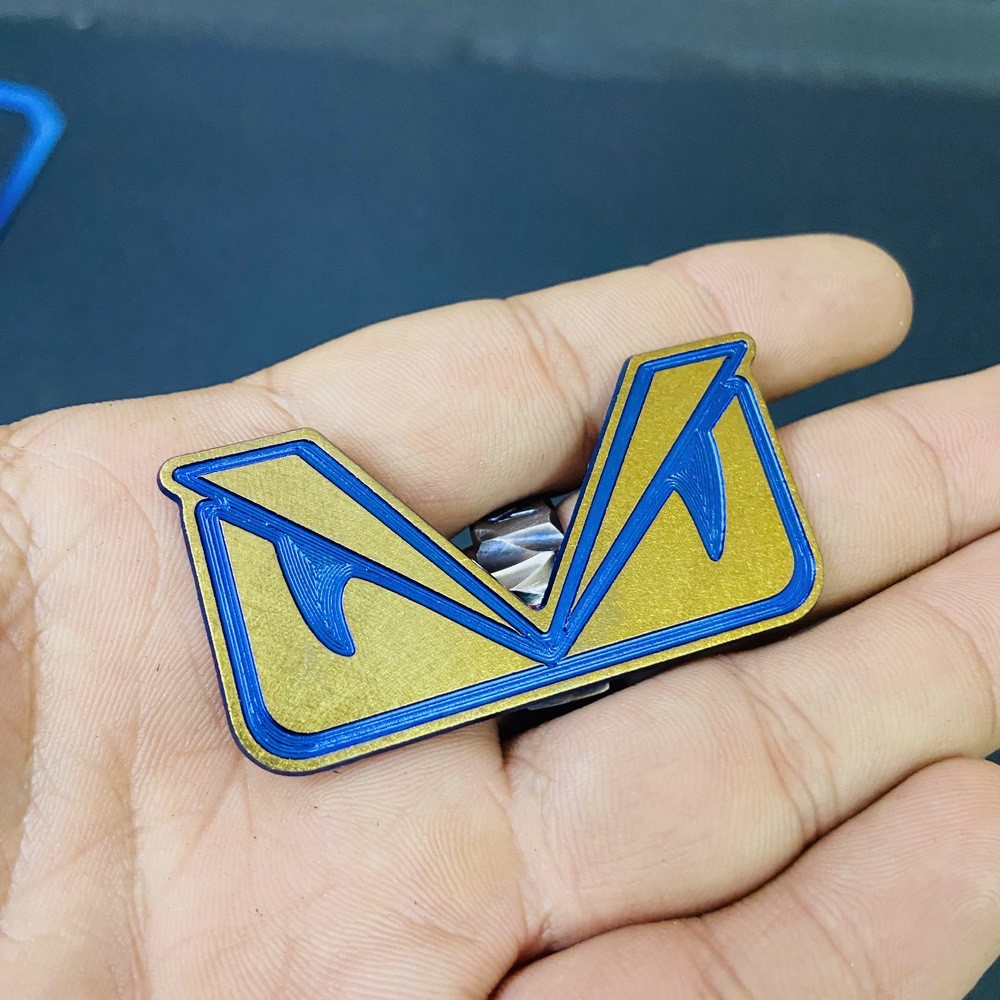 TEM trang trí xe máy HOẠT HÌNH MẮT CÚ chất liệu TITANNIUM