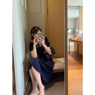 Đầm tiểu thư cổ sen cột nơ xinh xắn.