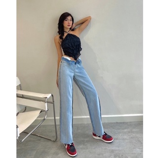 Quần jeans vắt sổ