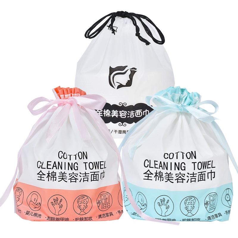 Khăn mặt khô dùng 1 lần lau khô, lau ướt , bông tẩy trang dạng cuộn kèm túi rút