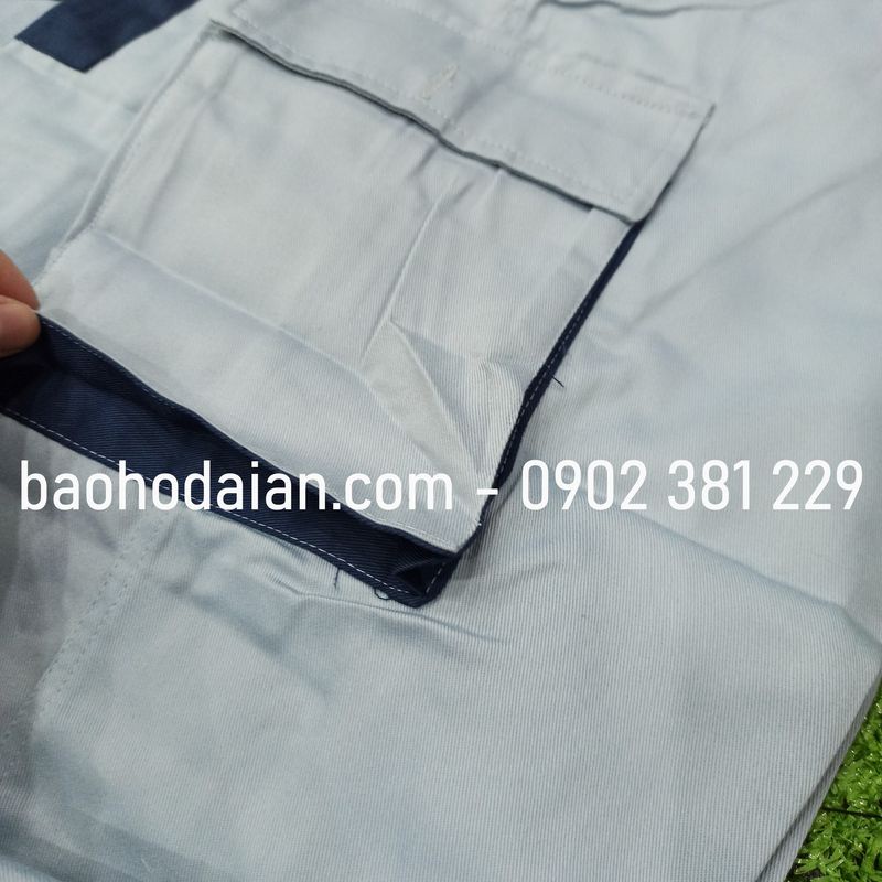 Quần áo bảo hộ lao động vải kaki 31 túi hộp ghi phối tím than lề đỏ - M14