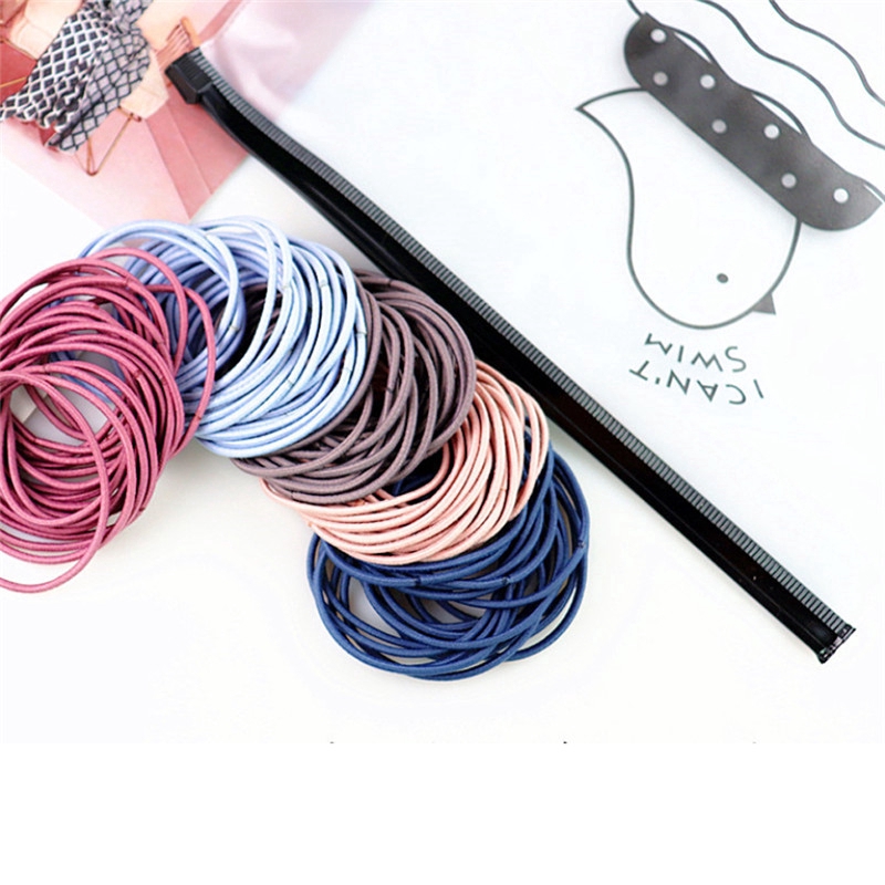 Set 50 dây buộc tóc cao su co giãn màu trơn cho nữ