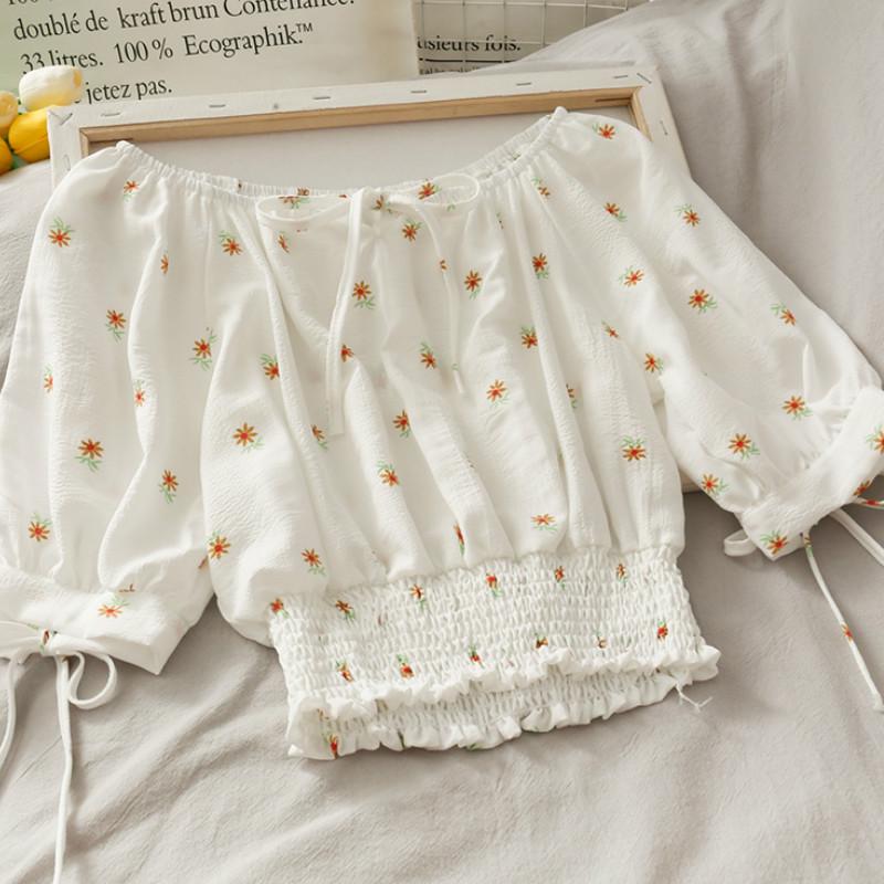 Áo croptop IELGY thắt nơ kiểu Pháp cổ thuyền in hoạ tiết hoa cúc cho nữ