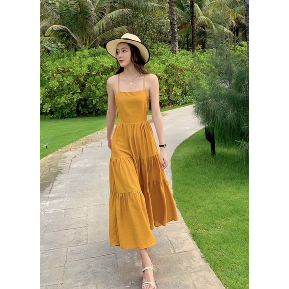 Đầm váy maxi vàng nghệ đan dây sau đi biển | BigBuy360 - bigbuy360.vn