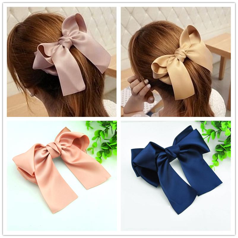 Dây buộc tóc hình nơ màu trơn tuyệt đẹp dành cho nữ