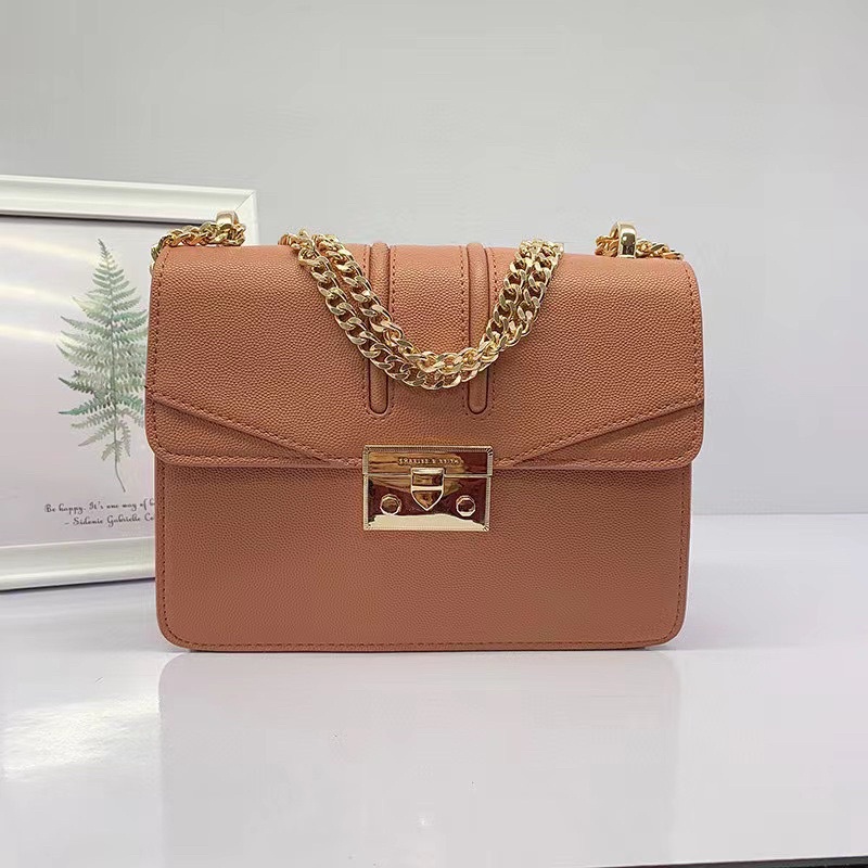 Túi đeo chéo quỳnh búp bê dây xích. hàng nội đại trung chuẩn xịn