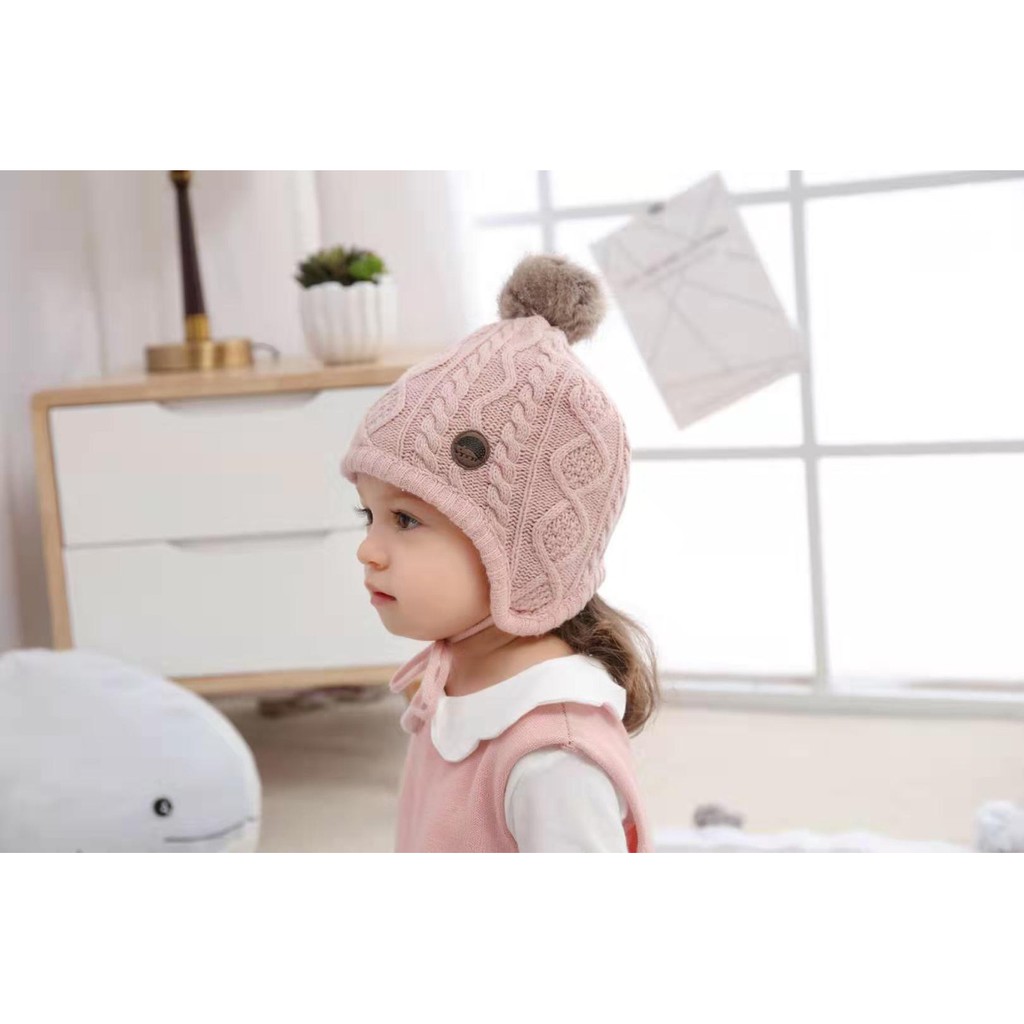 Mũ len quả bông buộc dây cho bé